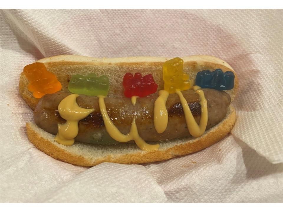 The Gummy Bear Brat is one of the new foods at the 2022 Wisconsin State Fair. It's a bratwurst infused with gummy bears and served on a bun that's topped with a honey mustard drizzle and gummy bear garnish. It will be located at Leadfoots Race Bar & Grill.