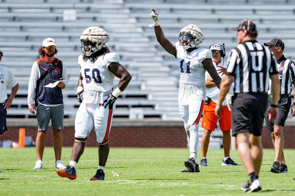 Auburn jack linebackers Elijah McAllister (11) during a scrimmage at Jordan-Hare Stadium on Aug. 12 2023.