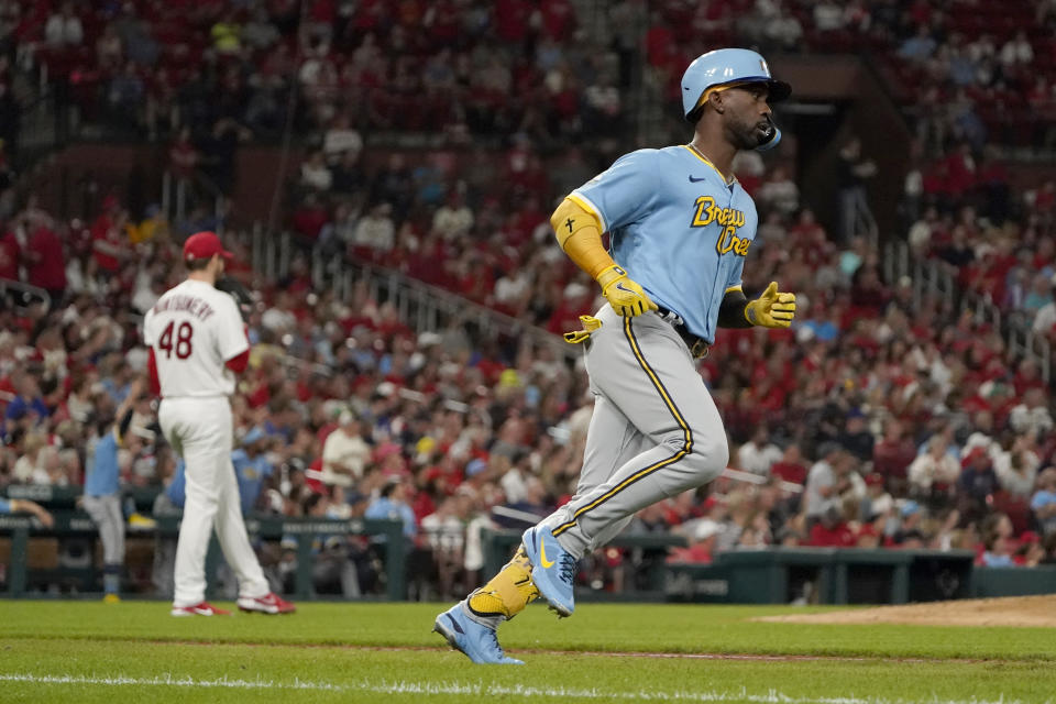 Milwaukee Brewers' Andrew McCutchen rounds the bases after hitting a two-run home run off St. Louis Cardinals starting pitcher Jordan Montgomery (48) during the fifth inning of a baseball game Tuesday, Sept. 13, 2022, in St. Louis. (AP Photo/Jeff Roberson)