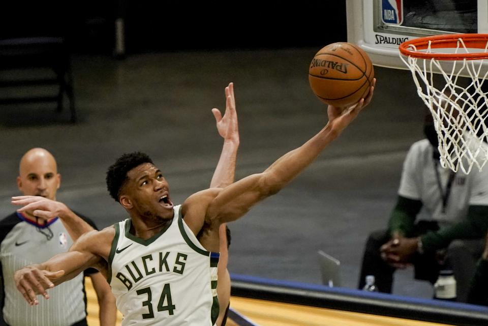 Milwaukee Bucks' Giannis Antetokounmpo shoots during the first half of an NBA basketball game against the Miami Heat Saturday, May 15, 2021, in Milwaukee. (AP Photo/Morry Gash)