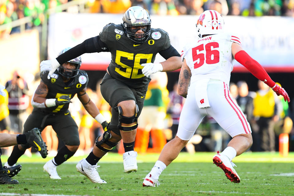 PASADENA, CA - JANUARY 01: Oregon Ducks (58) Penei Sewell (OL) gets ready to block during the Rose Bowl game between the Wisconsin Badgers and the Oregon Ducks on January 1, 2020 at the Rose Bowl in Pasadena, CA. (Photo by Brian Rothmuller/Icon Sportswire via Getty Images)