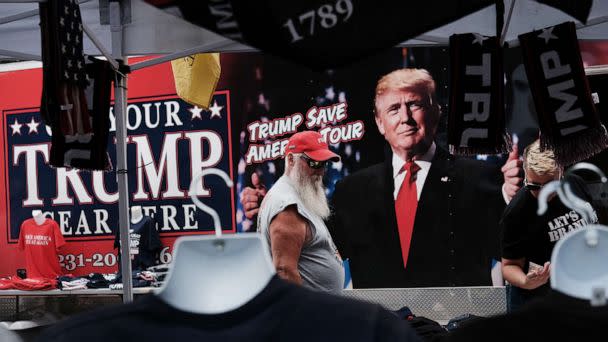 PHOTO: Merchandise is available for sale as people gather to hear former president Donald Trump speak as he endorses local candidates at the Mohegan Sun Arena, Sept. 3, 2022, in Wilkes-Barre, Pa.  (Spencer Platt/Getty Images)