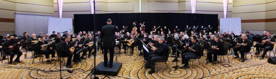 The convention finale Saturday night features the annual ensemble En Masse, with all participants playing.