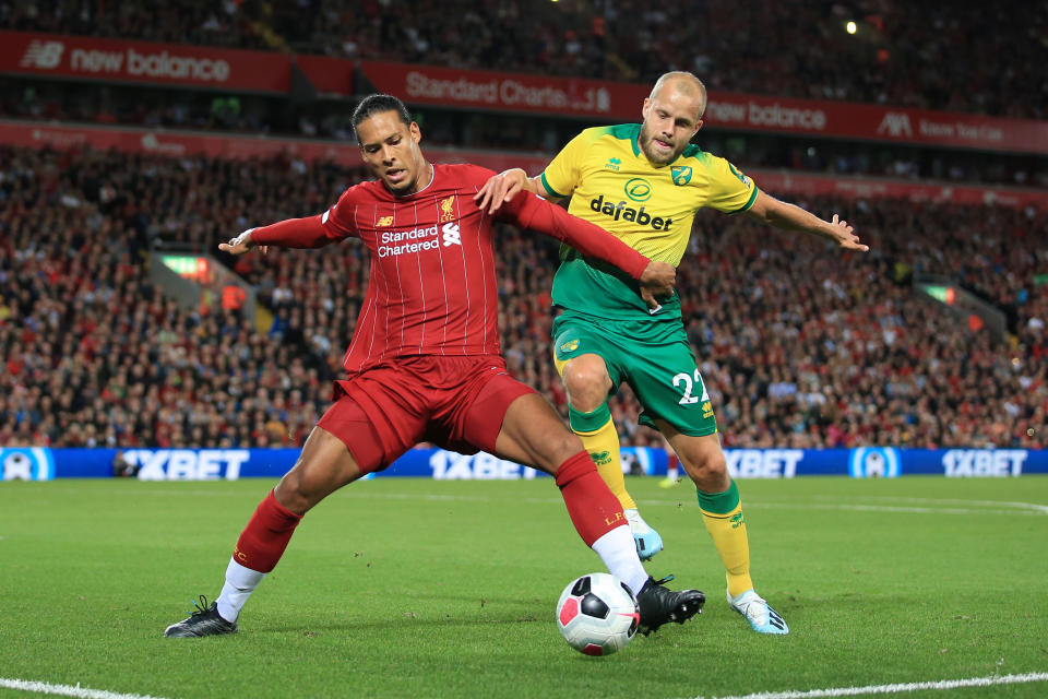 LIVERPOOL, ENGLAND - AUGUST 09: Virgil van Dijk of Liverpool battles with Teemu Pukki of Norwich during the Premier League match between Liverpool and Norwich City at Anfield on August 9, 2019 in Liverpool, United Kingdom. (Photo by Simon Stacpoole/Offside/Offside via Getty Images)