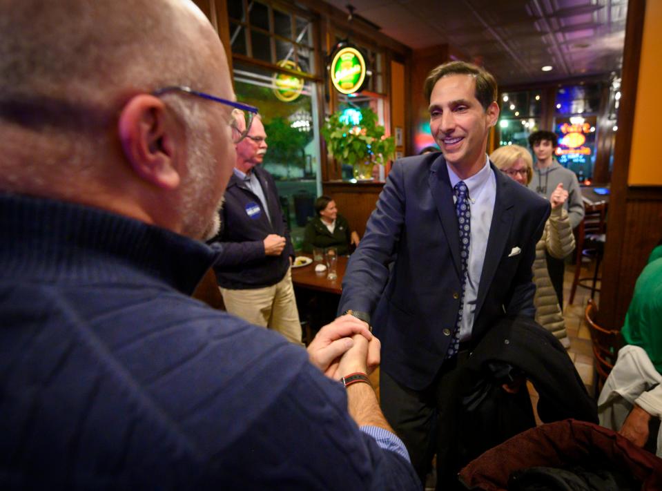 Democrat Miles Nelson arrives to a gathering of Hamilton County Democrats after the final results of his victory in the newly created Carmel City Common Council, West District race were confirmed. Candidates and supporters gathered at Muldoon’s in Carmel to watch as election results are posted, Tuesday, Nov. 5, 2019.