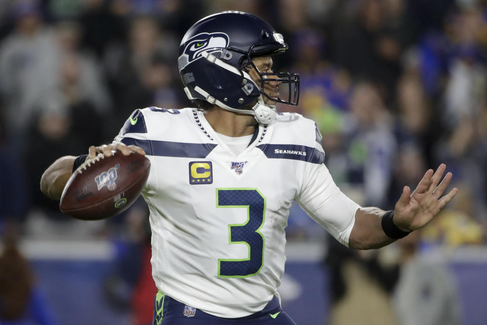 Seattle Seahawks quarterback Russell Wilson passes against the Los Angeles Rams during the first half of an NFL football game Sunday, Dec. 8, 2019, in Los Angeles. (AP Photo/Marcio Jose Sanchez)