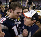 FILE - This Feb. 1, 2004 file photo shows New England Patriots quarterback Tom Brady and head coach Bill Belichick embracing after defeating the Carolina Panthers 32-29 in Super Bowl XXXVIII in Houston. Belichick became Patriots head coach in 2000 and drafted a skinny quarterback from Michigan with the 199th pick. The following season, the pair begin their run as the greatest quarterback-coach duo in NFL history by winning the first of their half dozen Super Bowls together. (AP Photo/David J. Phillip, File)