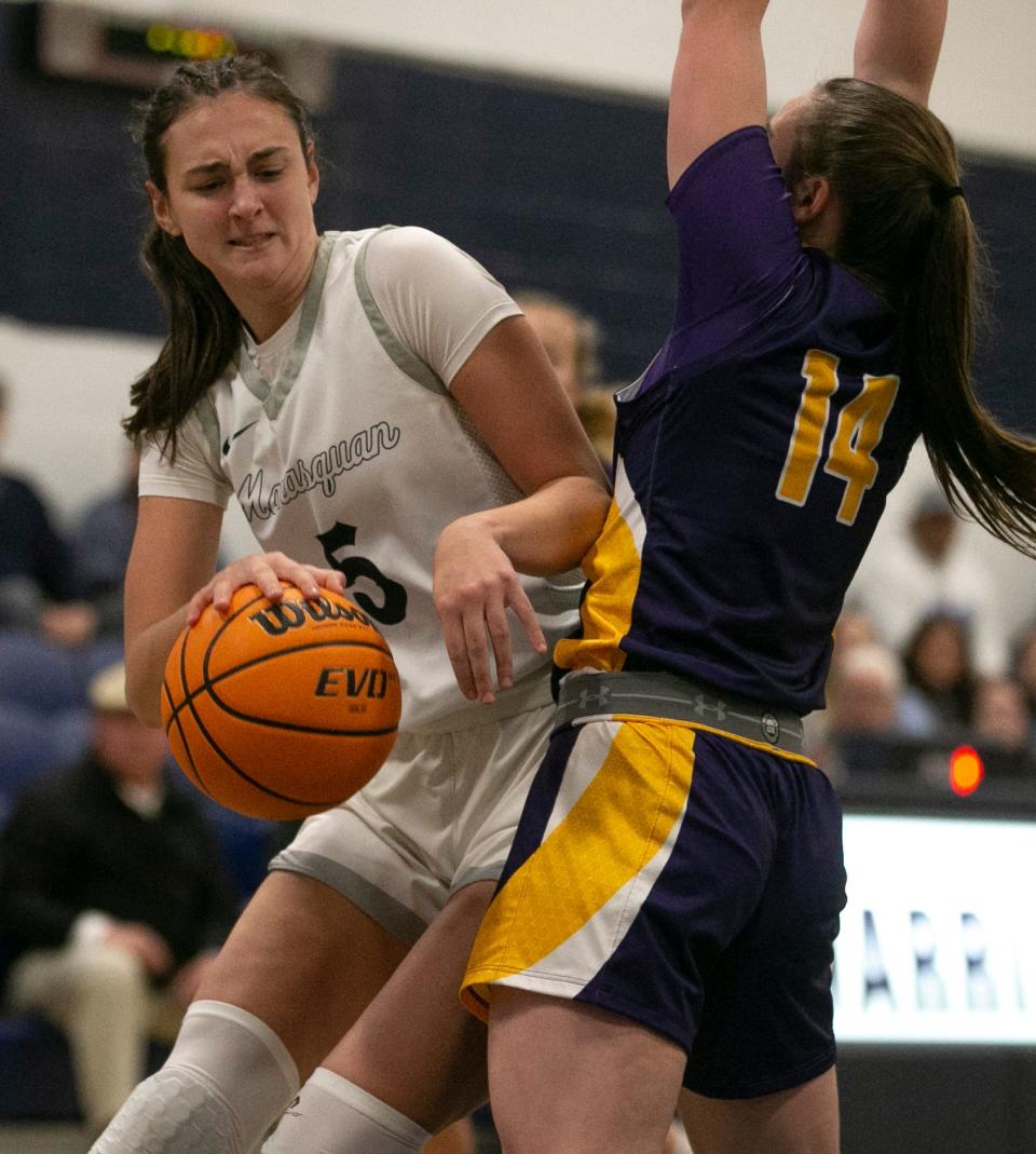 Manasquan’s Katie Collins drives to the hoop as St. Rose’s Cassidy Kruesi defends. St. Rose vs Manasquan basketball.      Manasquan, NJThursday, December 22, 2022