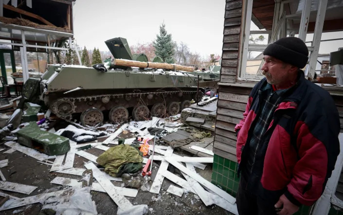 Gutted Russian military vehicles obstruct a road in the town of Bucha, close to Kyiv, Ukraine, on March 1.