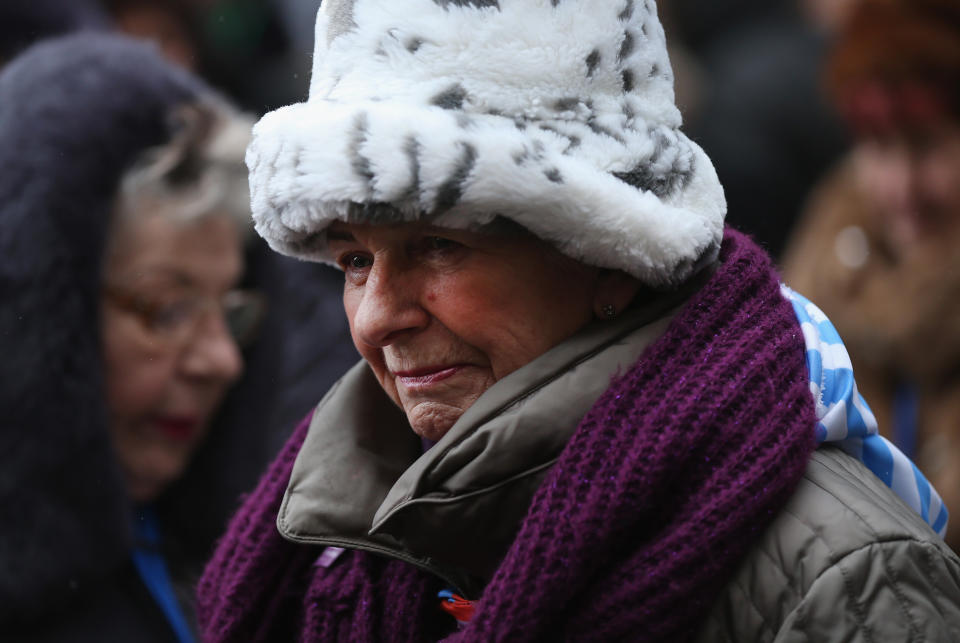 A member of an association of Auschwitz survivors departs following a wreath-laying ceremony at the execution wall at the former Auschwitz I concentration camp on January 27, 2015 in Oswiecim, Poland. International heads of state, dignitaries and over 300 Auschwitz survivors are attending the commemorations for the 70th anniversary of the liberation of Auschwitz by Soviet troops on 27th January, 1945. Auschwitz was among the most notorious of the concentration camps run by the Nazis during WWII and whilst it is impossible to put an exact figure on the death toll it is alleged that over a million people lost their lives in the camp, the majority of whom were Jewish.