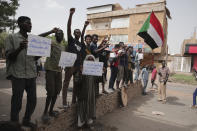 Anti-military protesters march on Friday, July 1, 2022 in Khartoum, Sudan, a day after nine people were killed in demonstrations against the country’s ruling generals. (AP Photo/Marwan Ali)