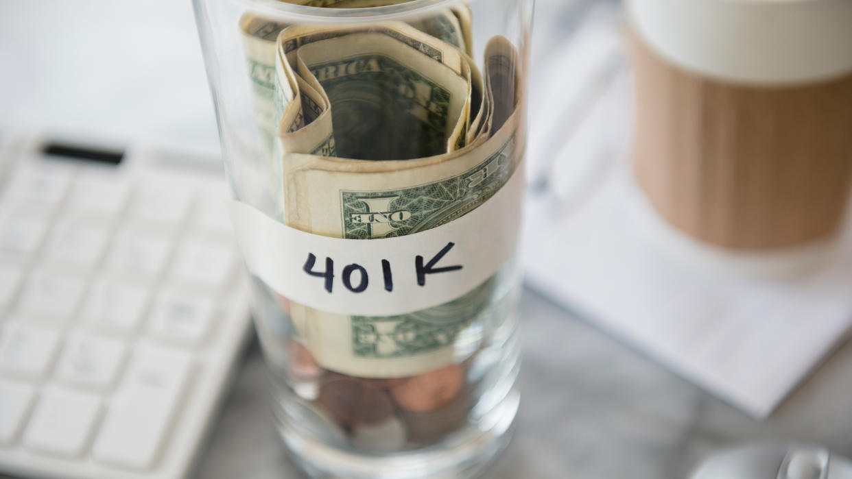 savings cup on office desk