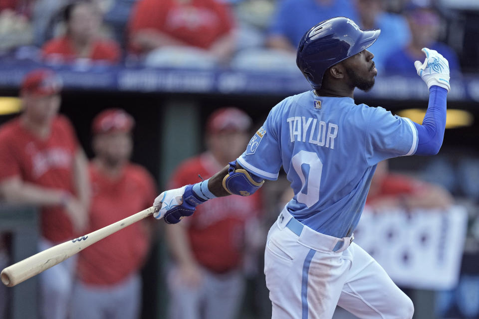 Kansas City Royals' Samad Taylor celebrates watches his a single to drive in the winning run during the ninth inning of a baseball game against the Los Angeles Angels Saturday, June 17, 2023, in Kansas City, Mo. The Royals won 10-9. (AP Photo/Charlie Riedel)