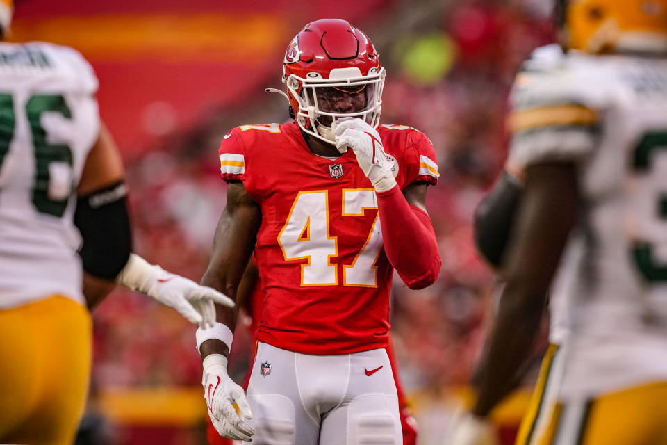 KANSAS CITY, MO – AUGUST 25: Darius Harris #47 of the Kansas City Chiefs looks in to the backfield pre snap during the first quarter of the preseason game against the <a class="link " href="https://sports.yahoo.com/nfl/teams/green-bay/" data-i13n="sec:content-canvas;subsec:anchor_text;elm:context_link" data-ylk="slk:Green Bay Packers;sec:content-canvas;subsec:anchor_text;elm:context_link;itc:0">Green Bay Packers</a> at Arrowhead Stadium on August 25, 2022 in Kansas City, Missouri. (Photo by Jason Hanna/Getty Images)
