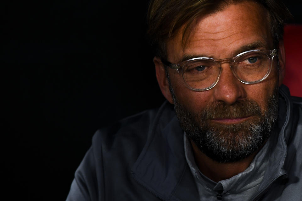 Liverpool coach Jurgen Klopp looks on from the dugout