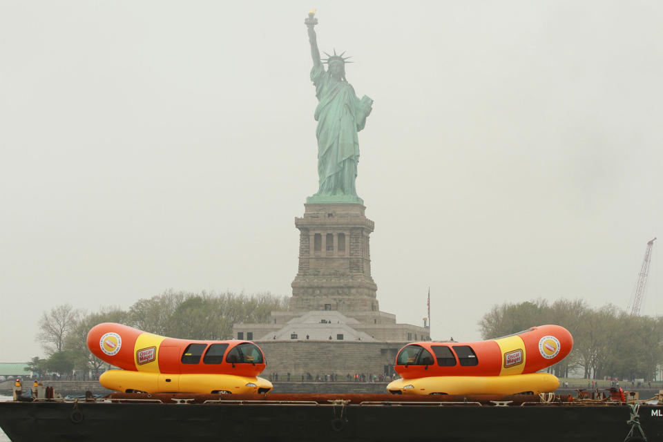 Oscar Mayer Wienermobiles float on NY Harbor