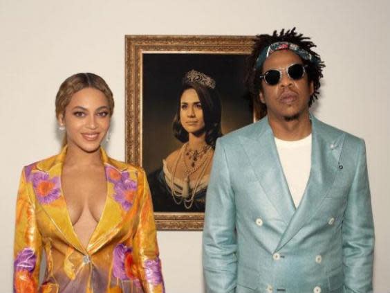 Beyonce and Jay Z accepted their Brit Award in front of a painting of Meghan Markle (Instagram)