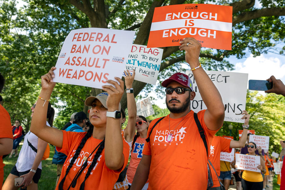 WASHINGTON, DC - JULY 13: Felix and Kimberly Rubio who lost their daughter Lexi in the Uvalde, Texas school shooting march in a rally calling for a federal ban on assault weapons on July 13, 2022 in Washington, DC. Friends, family and mourners of the victims of the Highland Park, Illinois and Uvalde, Texas mass shooting rallied near the U.S. Capitol calling on lawmakers to enact stricter gun control legislation.  (Photo by Kevin Dietsch/Getty Images)