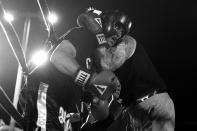 <p>Sgt. John Keigans and Sgt. Billy Polanco come together during a grudge match at the Brooklyn Smoker in the parking lot of Gargiulo’s Italian restaurant in Coney Island, Brooklyn, on Aug. 24, 2017. (Photo: Gordon Donovan/Yahoo News) </p>