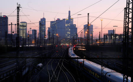 FILE PHOTO: Trains of German railway Deutsche Bahn arrive at the main train station in Frankfurt, Germany, March 27, 2019. REUTERS/Kai Pfaffenbach/File Photo