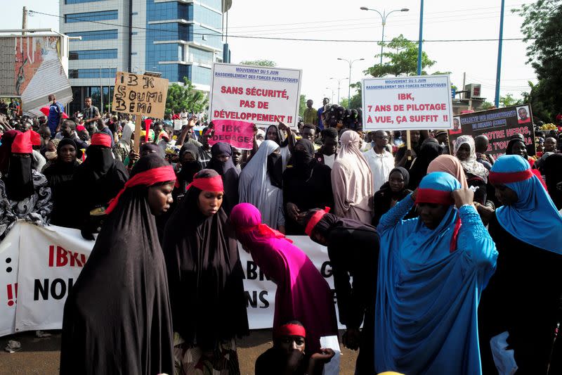Supporters of the Imam Mahmoud Dicko attend a protest demanding the resignation of Mali's President Ibrahim Boubacar Keita at Independence Square in Bamako