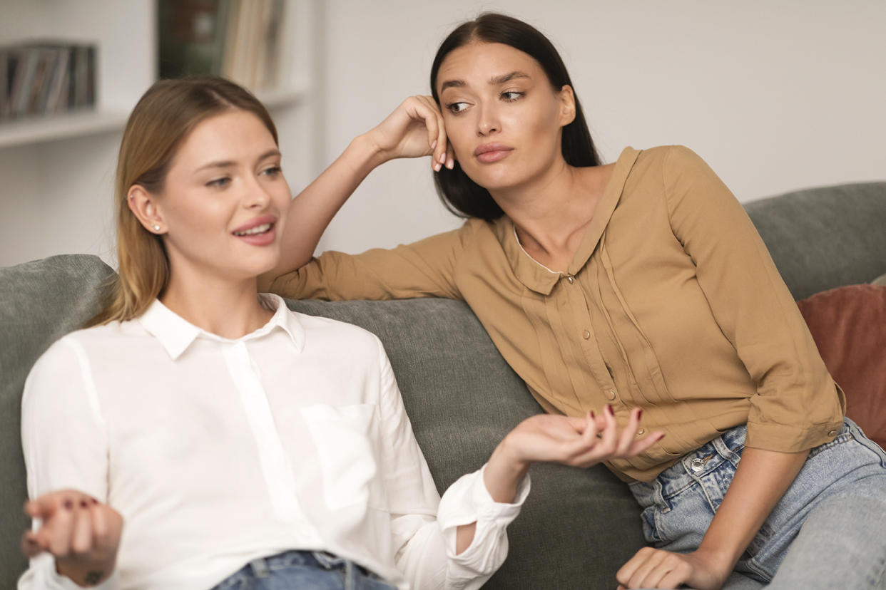 Jealous Woman Listening With Envy To Her Friend Bragging About Great Life 