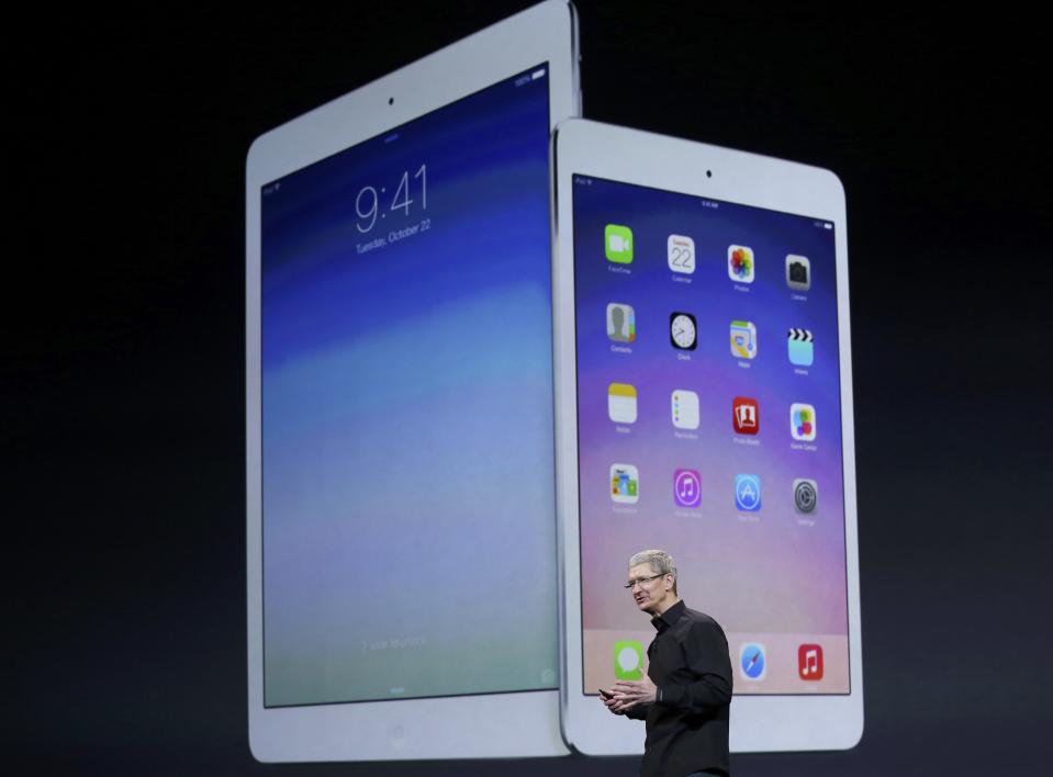 Apple Inc CEO Tim Cook speaks about the new iPad Air and the iPad mini with Retnia display during an Apple event in San Francisco