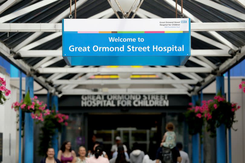 An exterior view shows the main entrance to Great Ormond Street Hospital in London, Tuesday, July 18, 2017. American Dr. Michio Hirano of Columbia University, who specializes in treating rare genetic conditions, is meeting on Monday and Tuesday with other specialists at the hospital treating Charlie Gard, assessing the critically ill 11-month-old for the first time. The parents have fought in court for permission to take the child to the United States for treatment. (AP Photo/Matt Dunham)