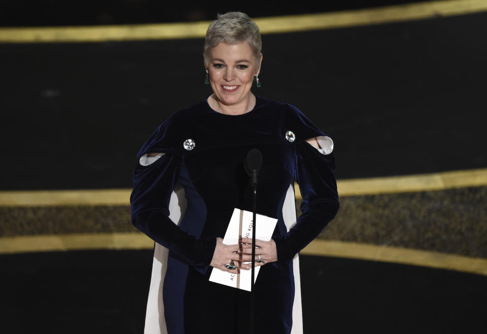 Olivia Colman presents the award for best performance by an actor in a leading role at the Oscars on Sunday, Feb. 9, 2020, at the Dolby Theatre in Los Angeles. (AP Photo/Chris Pizzello)