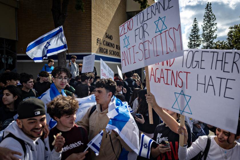 Woodland Hills, CA - February 27: Jewish students at El Camino Real High School walkout in response to recent antisemitic incidents at the school on Tuesday, Feb. 27, 2024 in Woodland Hills, CA. (Jason Armond / Los Angeles Times)