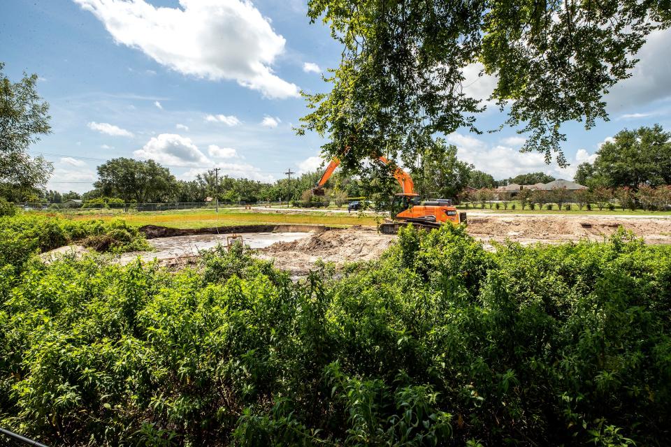 The sinkhole that formed just south of Fitzgerald Road, last Thursday is being filled in by an excavator as trucks full of dirt arrive on site. The hole was measured to be approximately 75-feet wide by 25-feet deep.