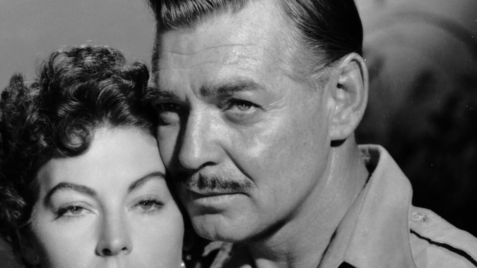 Clark Gable holds his lover in Mogambo