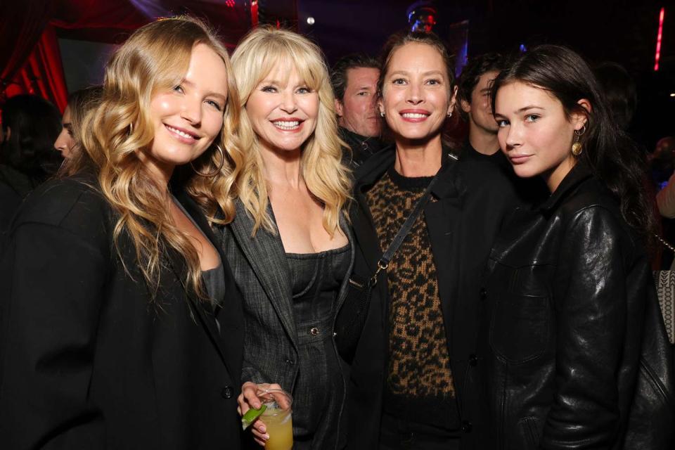 <p>Kevin Mazur/Getty</p> From Left: Sailor Brinkley Cook, Christie Brinkley, Christy Turlington Burns and Grace Burns