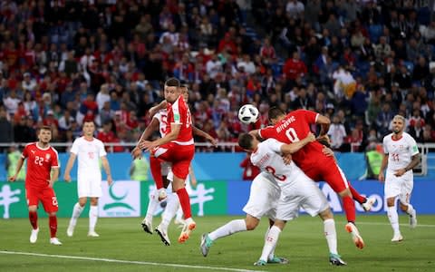 Lichtsteiner and Schaer double team Mitrovic and should have been penalised - Credit: Ryan Pierse/Getty Images