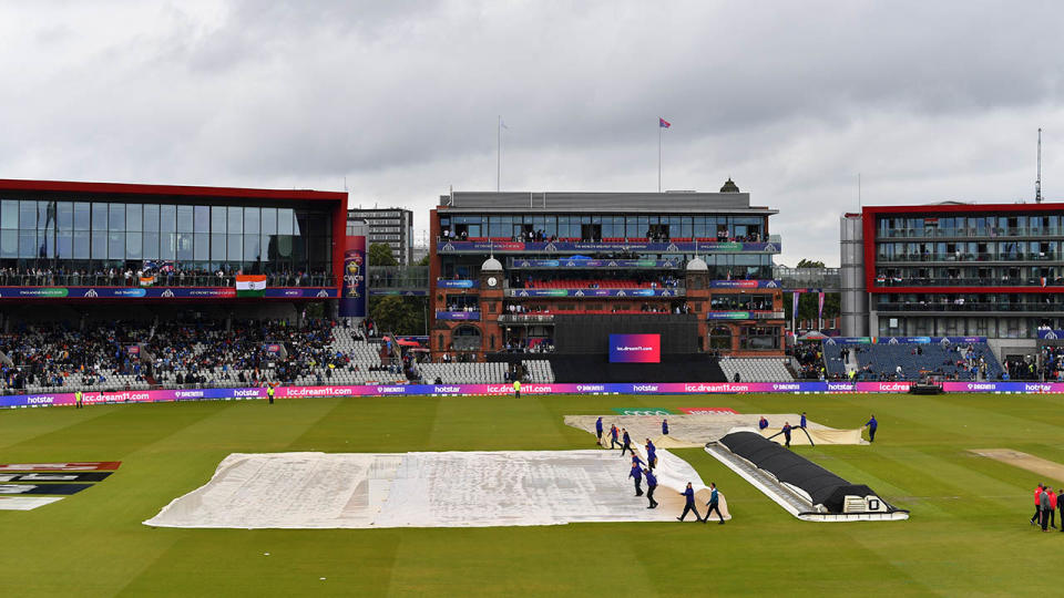 The match had to be put on hold. (Photo by PAUL ELLIS/AFP/Getty Images)