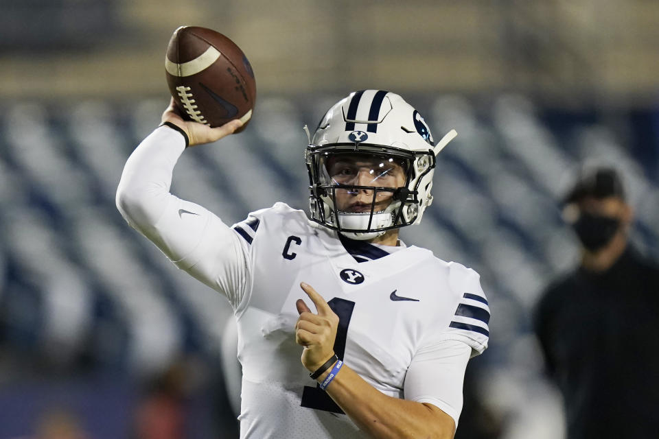 BYU quarterback Zach Wilson (1) warms up before an NCAA college football game against Western Kentucky, Saturday, Oct. 31, 2020, in Provo, Utah. (AP Photo/Rick Bowmer, Pool)
