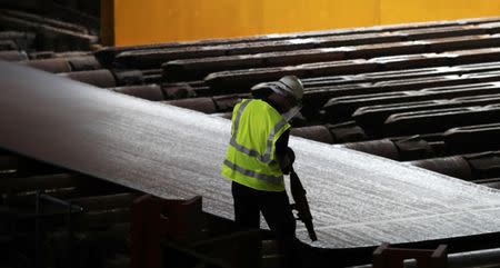 Steel is seen in the rolling mill following the recommissioning of the works by Liberty Steel Group at the Dalzell steel plant in Motherwell, Britain September 28, 2016. REUTERS/Russell Cheyne