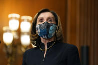 House Speaker Nancy Pelosi of Calif., speaks before signing the article of impeachment against President Donald Trump in an engrossment ceremony before transmission to the Senate for trial on Capitol Hill, in Washington, Wednesday, Jan. 13, 2021. (AP Photo/Alex Brandon)