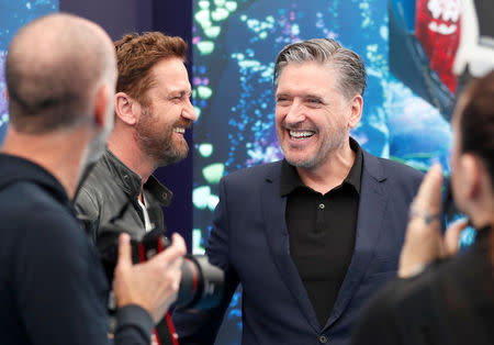 Cast members Gerard Butler and Craig Ferguson attend the premiere of "How to Train Your Dragon: The Hidden World" in Los Angeles, U.S., February 9, 2019. REUTERS/Mario Anzuoni