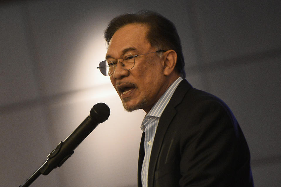 Anwar said he is not 'apologetic' that his stance on equality led to claims he was no longer representing Malays and Islam, telling PKR members that their duty was to all Malaysians regardless of race. — Picture by Miera Zulyana