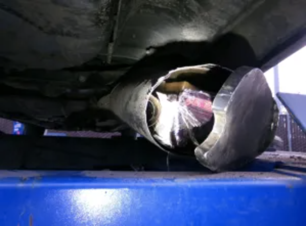 CBP officers at the Otay Mesa Port of Entry found a variety of narcotics hidden in the muffler of a vehicle. / Credit: CBP