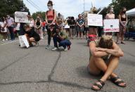 People react outside the memorial service for George Floyd following his death in Minneapolis police custody, in Minneapolis