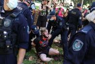 A person is arrested by police during an Australia Day protest in Sydney