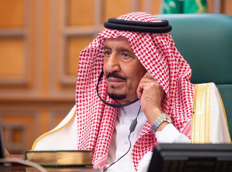 Saudi King Salman bin Abdulaziz attends via video link a virtual G20 summit on coronavirus disease (COVID-19), in Riyadh