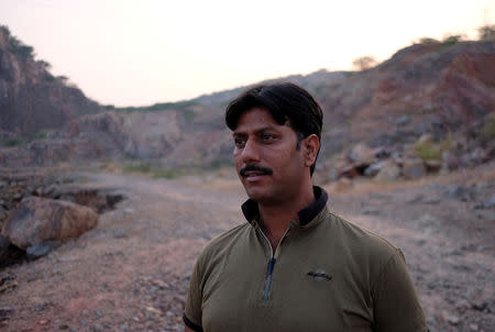 Kailash Bidhuri, the founder of a local environmental group Save Aravalli, looks on in a disused sandstone quarry near the village of Sirohi in Haryana, India, October 29, 2018. REUTERS/Alasdair Pal