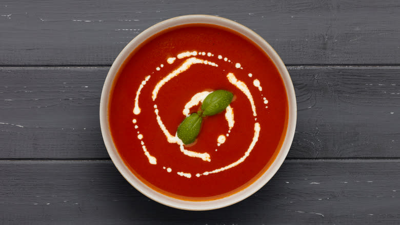 Tomato soup with drizzled cream