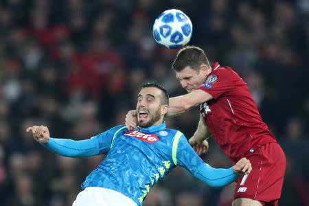 Soccer Football - Champions League - Group Stage - Group C - Liverpool v Napoli - Anfield, Liverpool, Britain - December 11, 2018 Liverpool's James Milner in action with Napoli's Nikola Maksimovic REUTERS/Jon Super