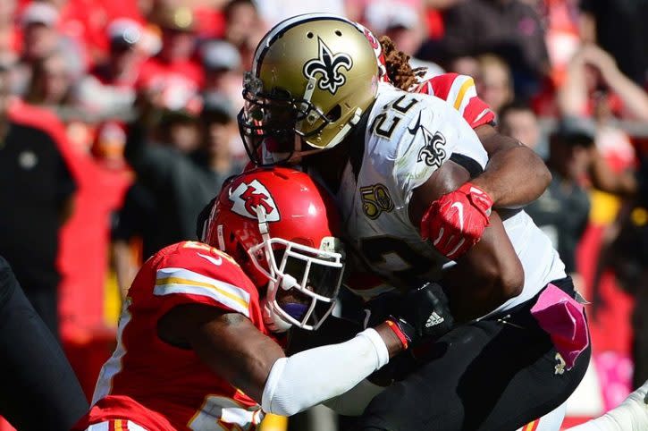 Oct 23, 2016; Kansas City, MO, USA; New Orleans Saints running back Mark Ingram (22) is tackled by Kansas City Chiefs strong safety Eric Berry (29) during the second half at Arrowhead Stadium. The Chiefs won 27-21. Mandatory Credit: Jeff Curry-USA TODAY Sports