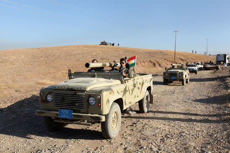 Peshmerga forces advance in the east of Mosul to attack Islamic State militants in Mosul, Iraq, October 17, 2016. REUTERS/Azad Lashkari