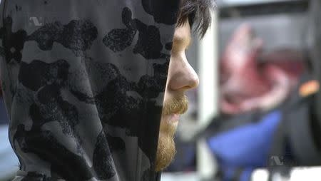 Ethan Couch, known as the "affluenza" teen after he killed four people in a drunk driving incident in 2013, is seen at Mexico's National Institute of Migration before being driven to the international airport in this still image from a video provided by the Institute, in Mexico City, January 28, 2016. REUTERS/National Institute of Migration/Handout via Reuters